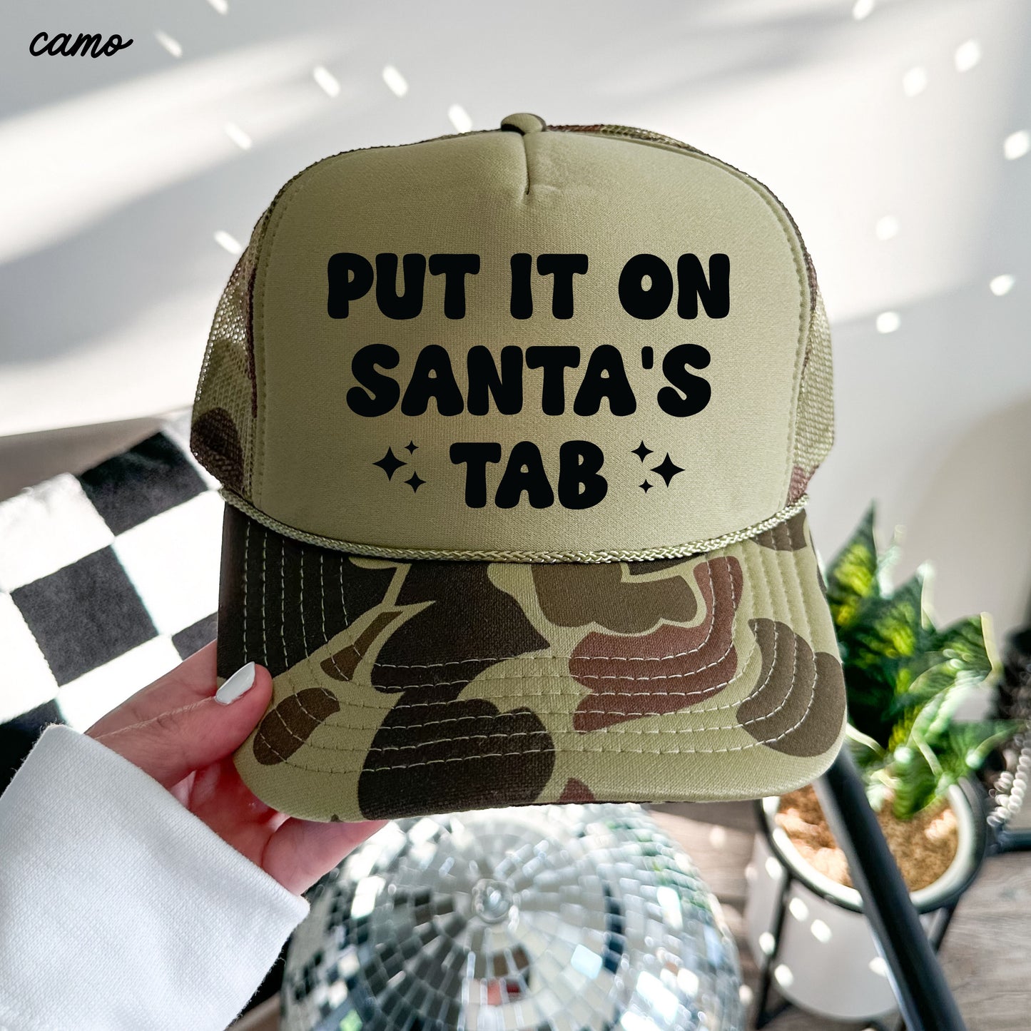 Put it on Santa's Tab Trucker Hat *8 Colors