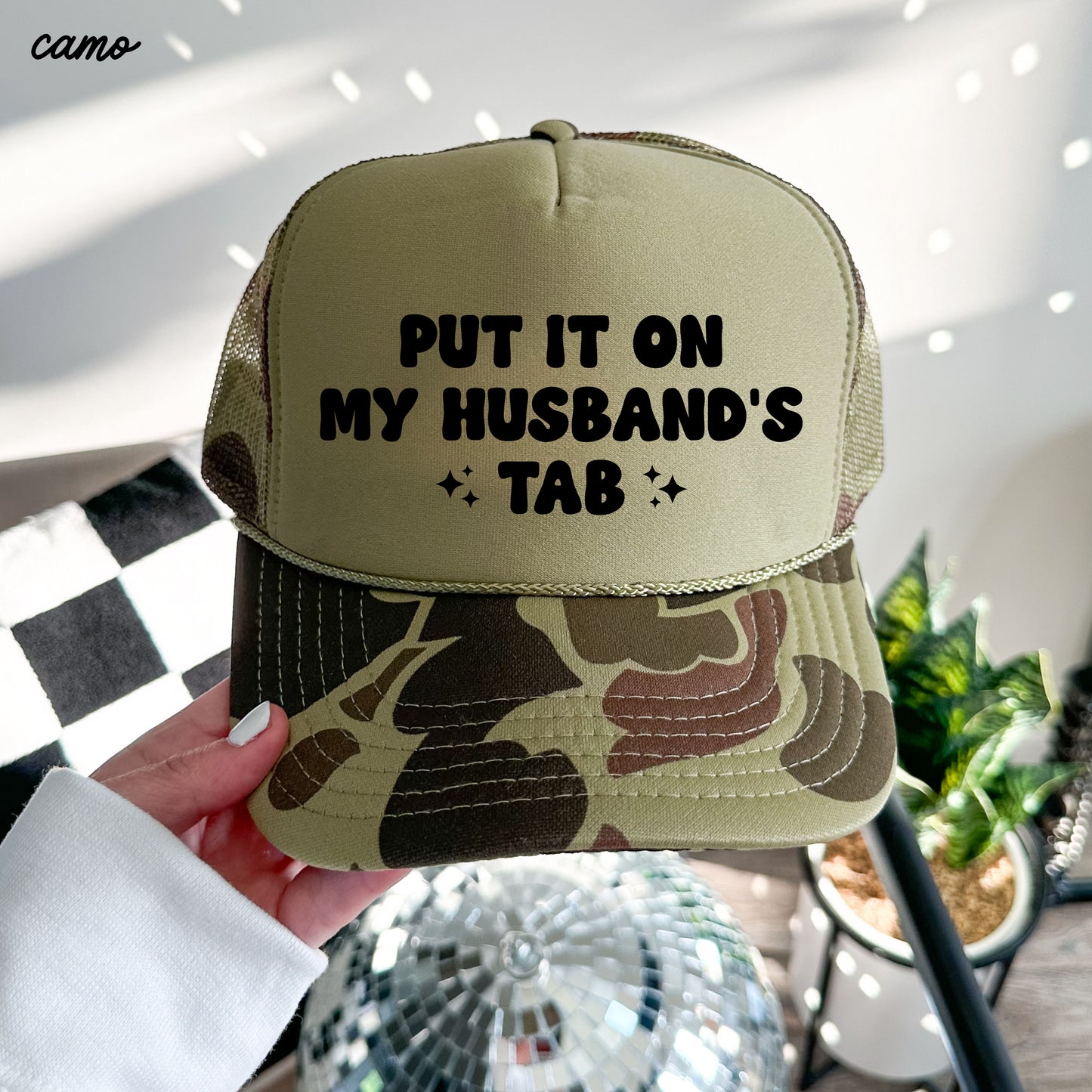 Put It On My Husband's Tab Trucker Hat *12 Colors